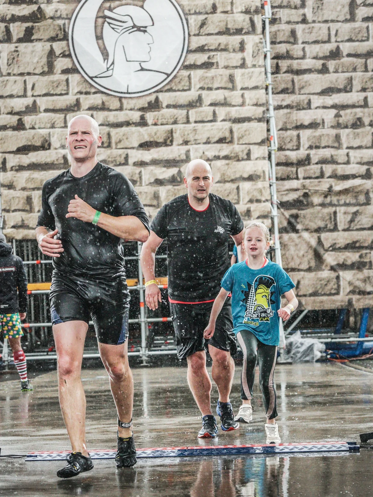 Bjorn at the Spartacus finish line with one of his children